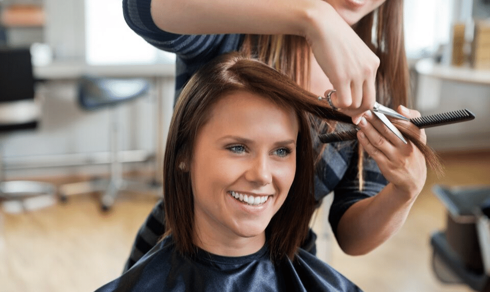 hairdressers cutting hair